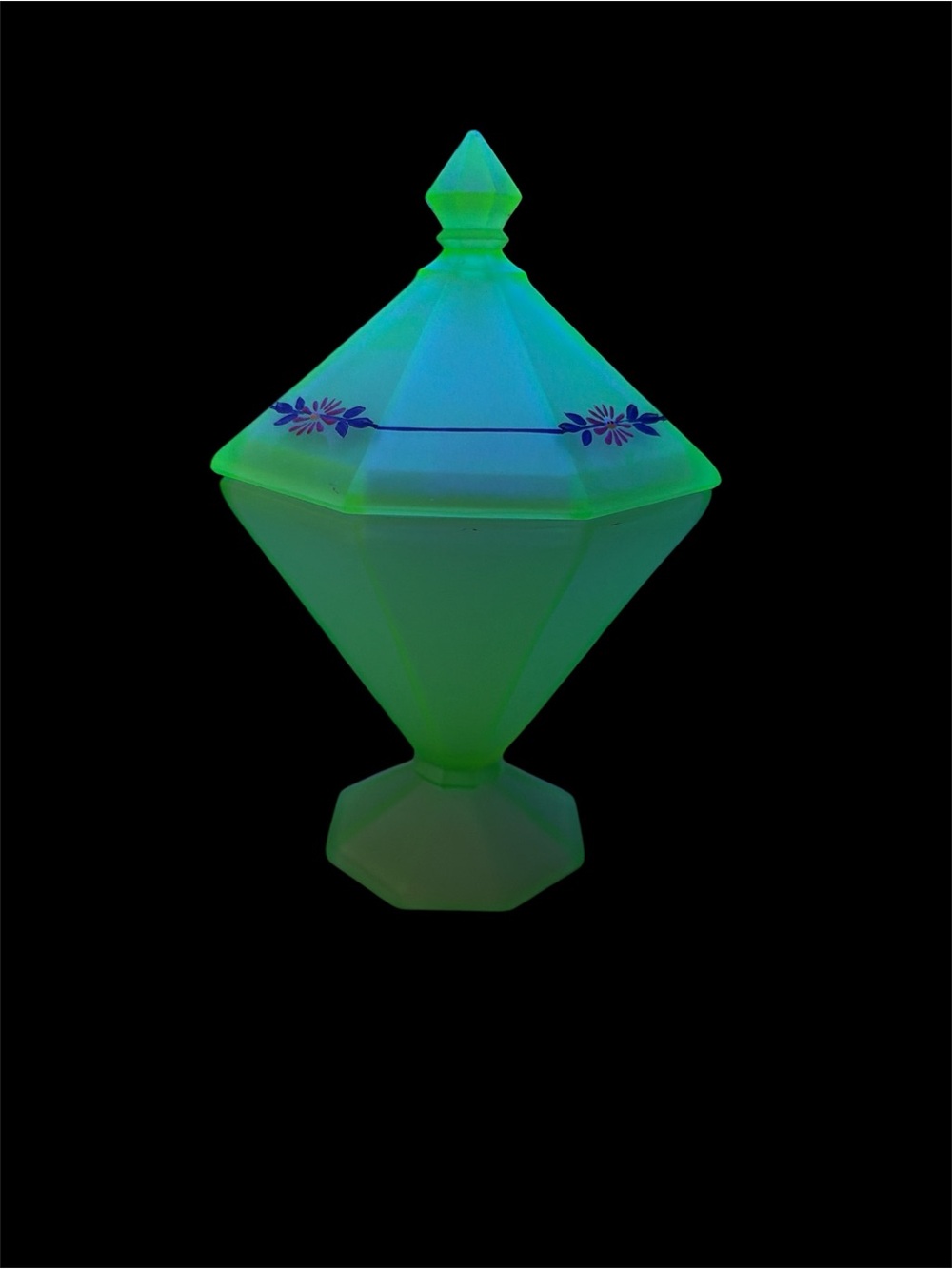 Glowing green glass candy dish